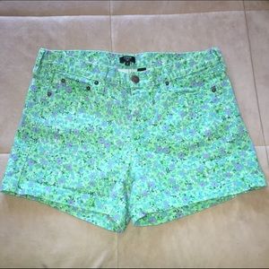 High waisted floral denim shorts.